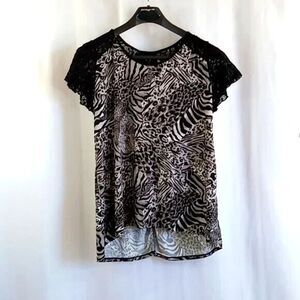 Suzie in The City size 2X animal print blouse *